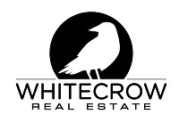 White Crow Real Estate Company Logo