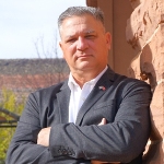 Gregory  Maurer